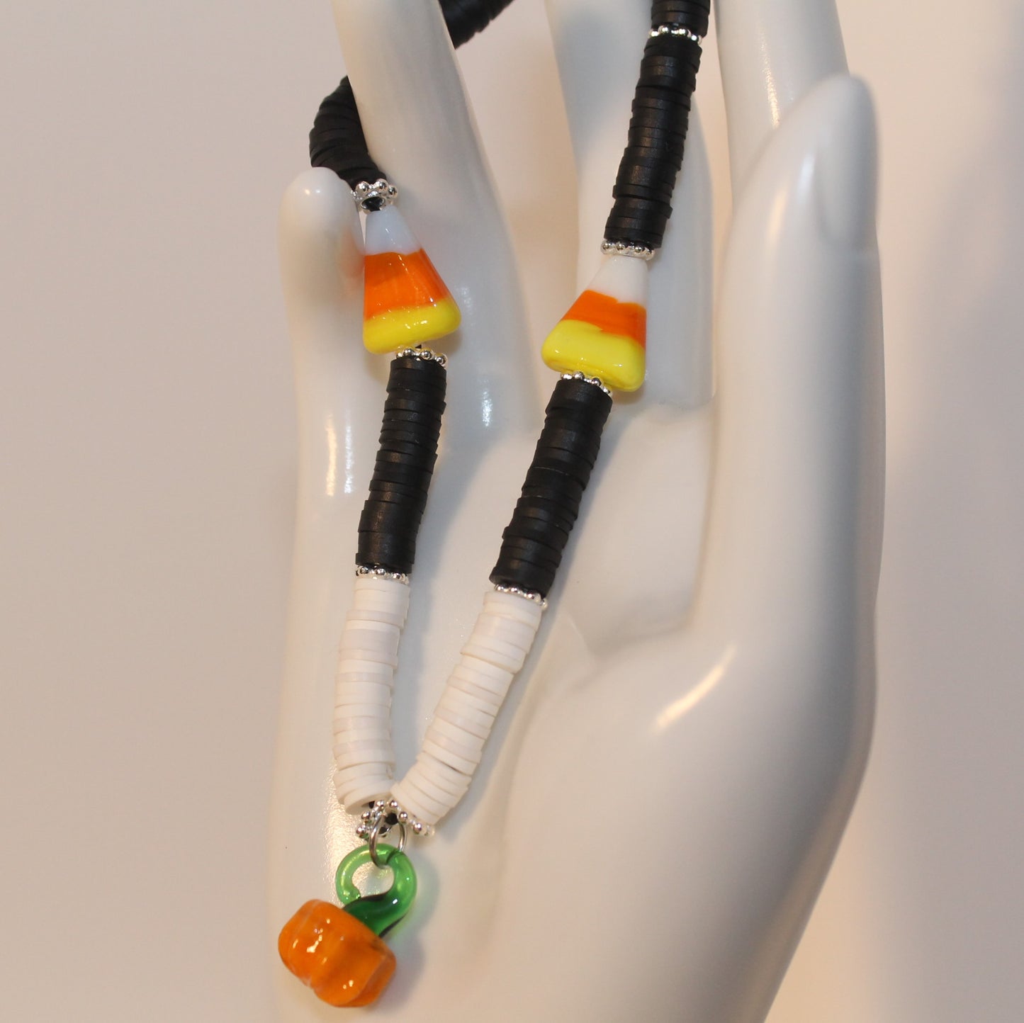 Black Candy Corn with Pumpkin Phone Strap