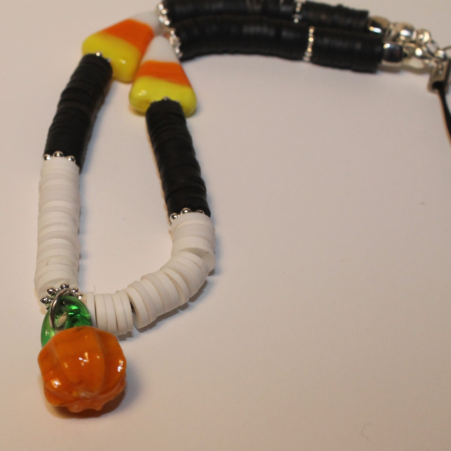 Black Candy Corn with Pumpkin Phone Strap